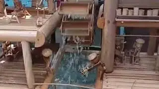Cara membuat kerajinan bambu kincir air