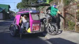 Philippines, tricycle ride from Prime Water to Starmall
