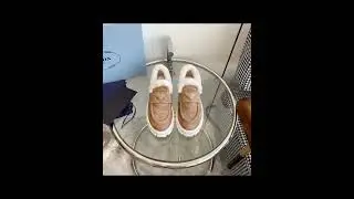 Prada triangle logo shearling loafers