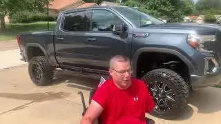 2019 GMC lifted a wheelchair accessible at4 truck goes mudding.