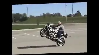 Reckless Stunt Biker Tips Over