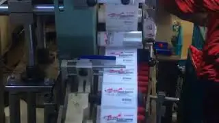 LABELING MACHINE FOR PEN BARREL