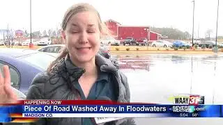 Piece of Road Washed Away In Floodwaters