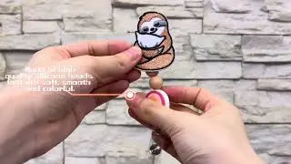 Sloth Badge Reels shows off your spirit animal and makes you smile every time you look at it.