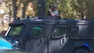 Officer shot in Sandy Springs SWAT standoff; suspect surrenders, police say