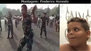 Gordinho rindo do exército dançando.