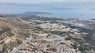 Coastal aerial overview, Survey from above showing coastal settlement and infrastructure layout