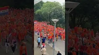 Netherlands (dutch) fans dance in the streets of Dortmund ahead of Euro 2024 England Semi Final
