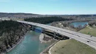 Bow River Crossing Bridge Pan Drone Footage - May 2025