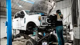 Tearing down this HUGE F-250 with a custom fabricated suspension