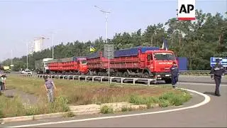 Humanitarian aid convoys from Russia and Ukraine are traveling from opposite directions to the embat