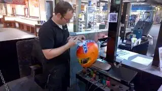 Airbrushing Northeast Ohio Dukes stunt helmet