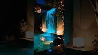 Discover the Magic of This Illuminated Waterfall Garden at Night