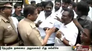 DMDK workers protest to arrest miscreants for attacking party office