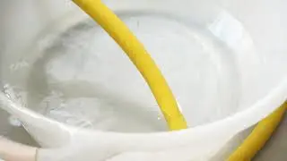 Cleaning a floor using aqueous ozone without chemicals
