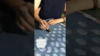 Hand block printing on a natural indigo dyed fabric