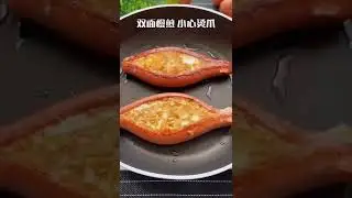 2 Salchichas. 4 Huevos.