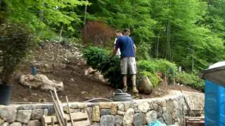Preferred Properties plants trees and shrubs ontop of this newly built masonry wall