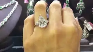 Custom made 6.00ct + pear shape with pear shaped side diamonds