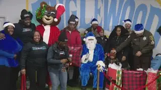 Police and sheriff's officers deliver gifts for Operation Chicago Blue Santa