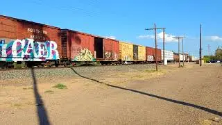 CSXT 7665 leads auto train through Gilbert, AZ