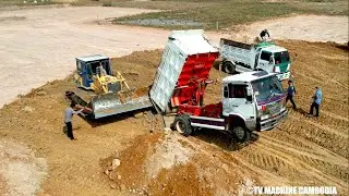 Extreme Showing Dump Truck Unloading Soil Fly With Stonger Dozer D53P Pushing Soil