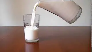 Milk Being Poured In Glass