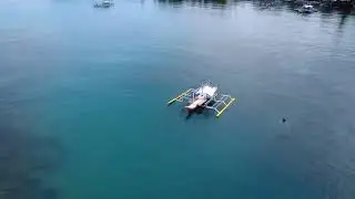 Circling a bangka (pump boat) in the South China Sea with my DJI Mini 4k