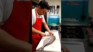 Beautiful Distant View of Professional Fish Cutting Scene