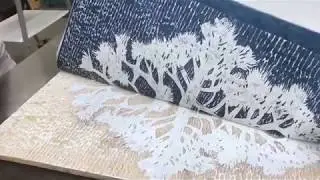 Brandie Dziegel press pulling large scale woodblock prints @ DFAC 2018