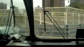 (3) train shuttle bus making illegal U-turn at W. 155th St