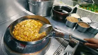 Приготовление знаменитой жареной лапши