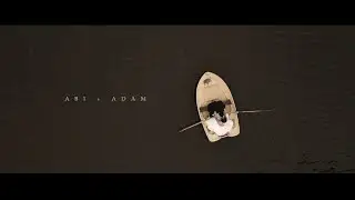 Browsholme Hall Lancashire Wedding Film Ribble Valley couple rowing a boat on the lake.
