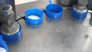 5gallon cap lining machine