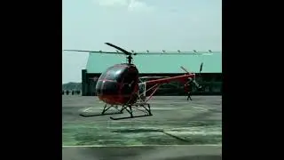 Hughes 300C in Hover Flight