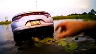 Woman Saved From Submerged Car