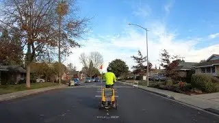 #bikingwithbliss over speed hump lines that remind me of Mario Kart dash panels
