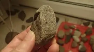 Stone age rock art; 5 faces one rock