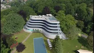 Experience the Future: Drone Footage with CGI Overlay of New Building Construction