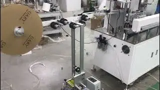 Explain velcro tape winding cutting machine