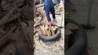 Tire-assisted log splitting method