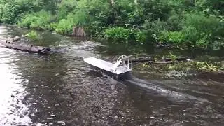 RC air boat jumping logs