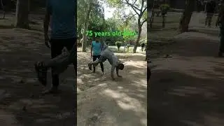 75 years old man trying back handspring #music #fitness #75years