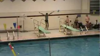 Me Diving 102C Fowared 1 Summersualt in the Tuck Position