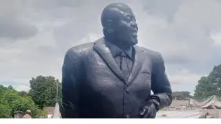 Wicknell Chivhayo not impressed with the statue of himself.