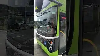 Cool Bus! SBS Transit BYD K9RC Gemilang Electric Departing bus stop with red wheel nuts SG4005Z