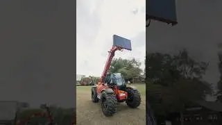 Red JCB Loadall to be used in disaster relief and extreme weather response