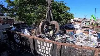 loading a full scrap trailer insane crane view!