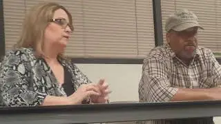 Lucinda and Rob speaking to a group in Phoneix 1/2