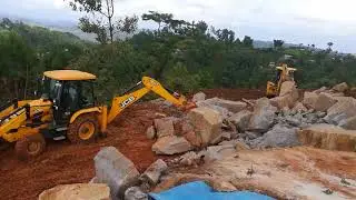 jcb 3dx super removing rock ## jcb dozer removing Rock